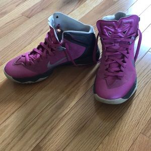 Pink Nike Zoom basketball sneakers